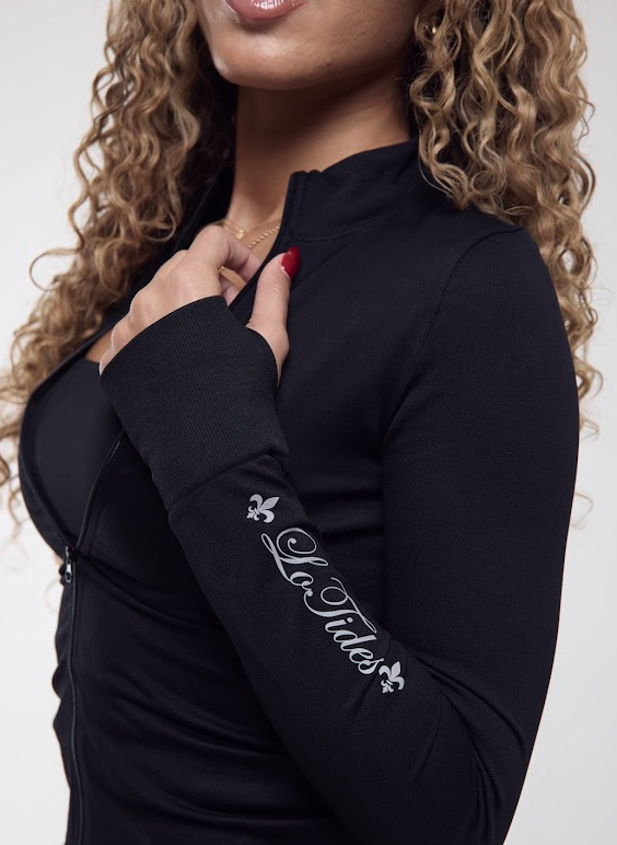 Black long-sleeve top with 'Lo Tides' branding on a white background